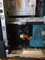 Notice the plastic plugs in front of the drive.