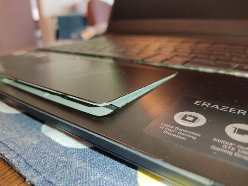 Trackpad lift at its worst, just before removing the battery