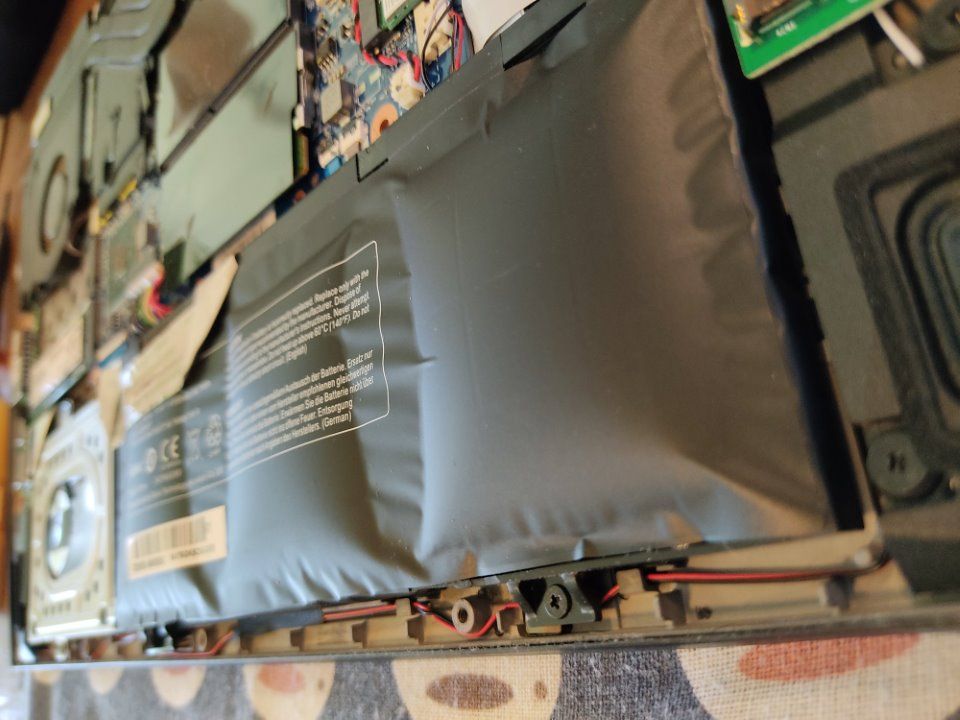 The 3 battery sections swollen into 'pillow' shapes