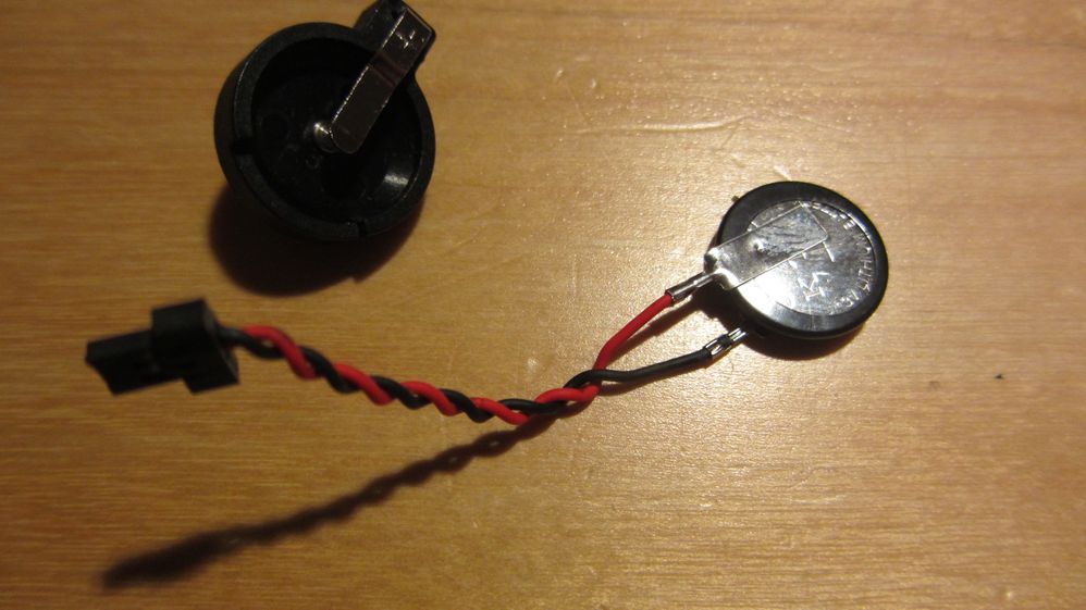 Batteriehalterung und original Batterie ohne Hülle